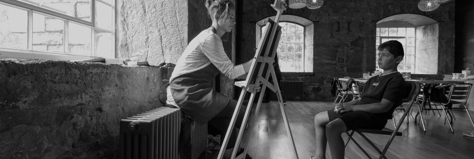 sitting_for_a_portrait_in_historic_Royal_William_Yard
