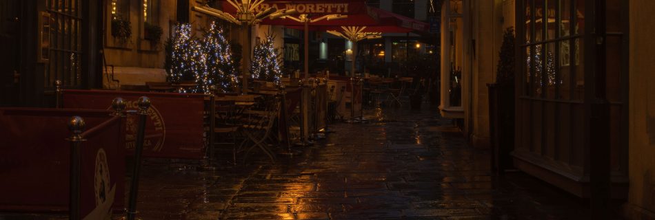 historic_bath_side_street_featuring_café_wet_pavement_and_post-rain_reflections
