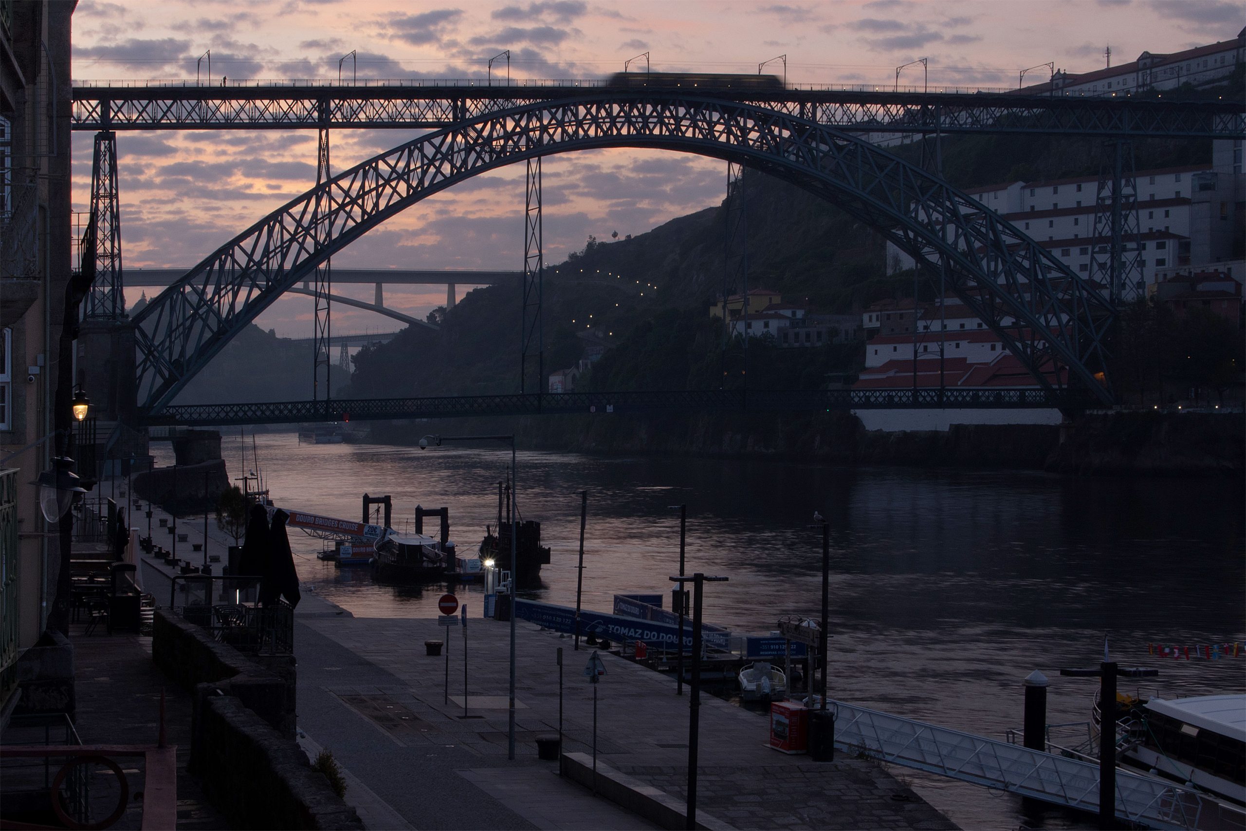 Dom Luís I Bridge spanning the Douro River with Porto waterfront views